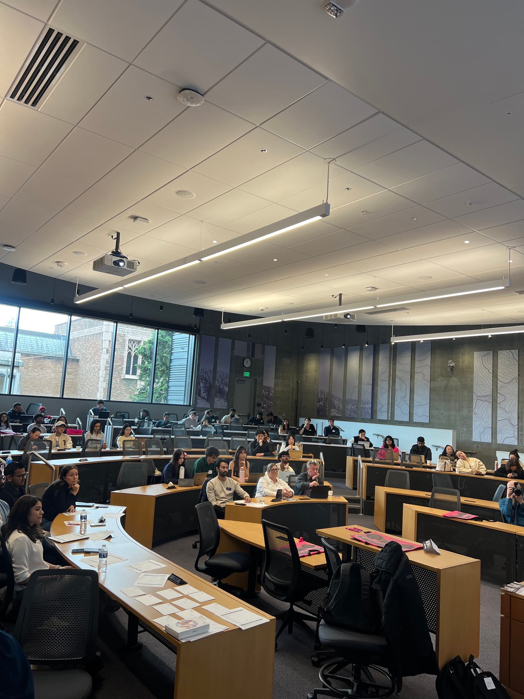 Participants and judges seated in the hackathon classroom.
