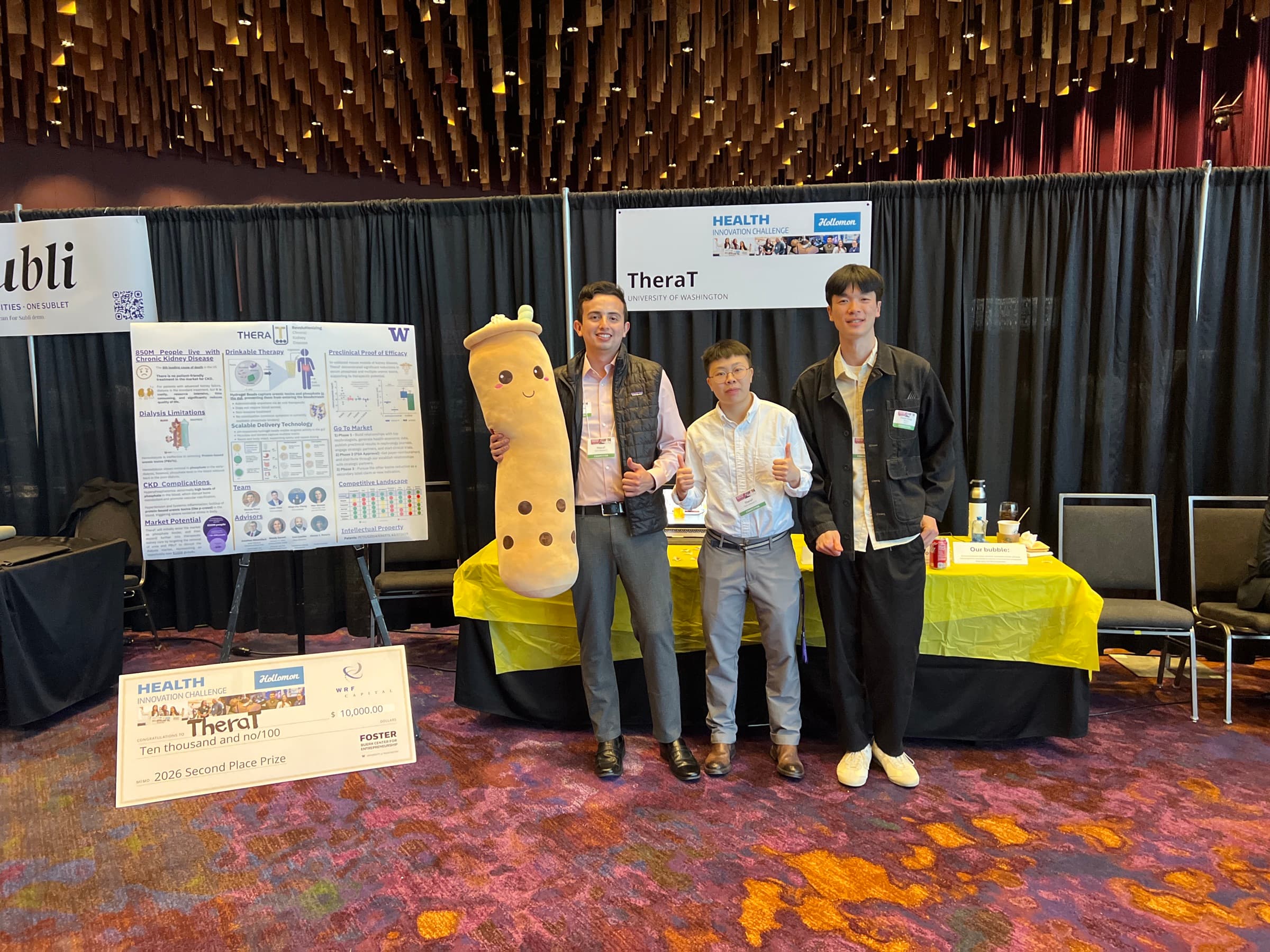 Nicolas with Dr. Louis Chen, a recent UW PhD graduate, and MingChe Chung, a PhD student, at TheraT’s Dempsey Startup Competition exhibit.