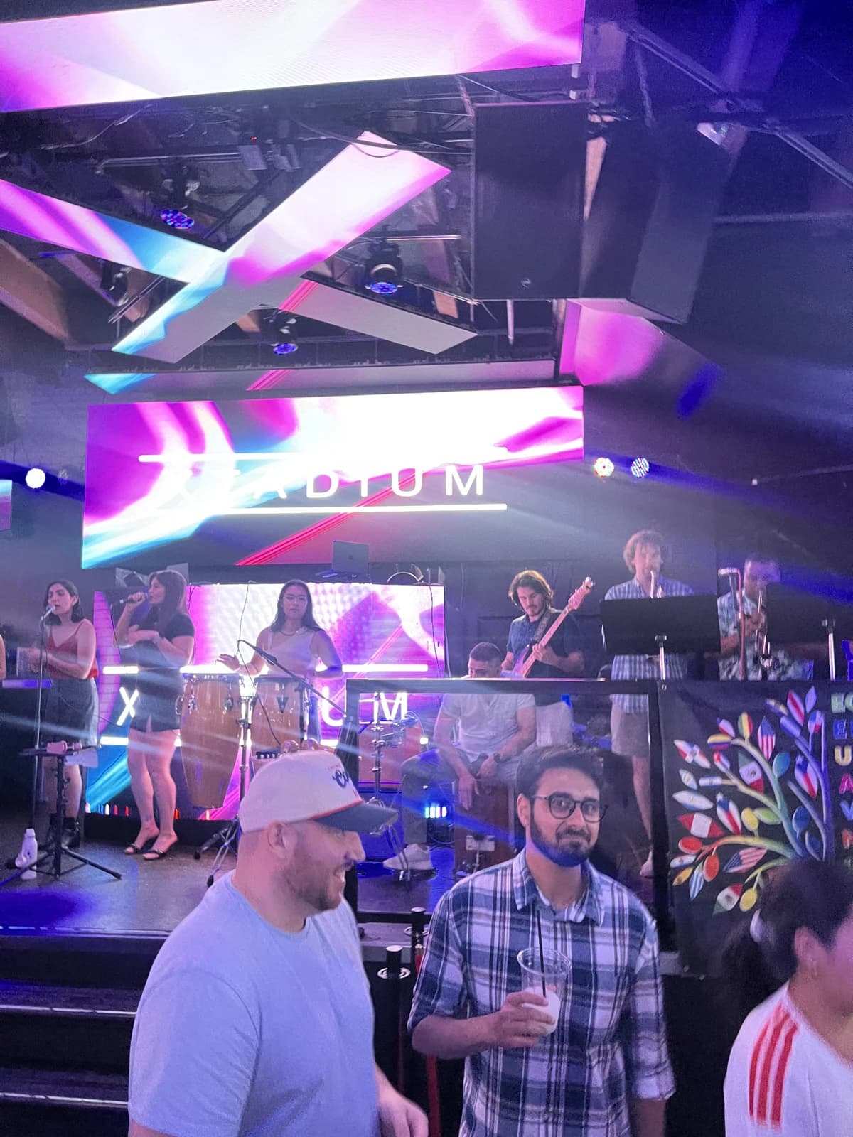 Musicians performing on the Xtadium stage during Latin Carnival.