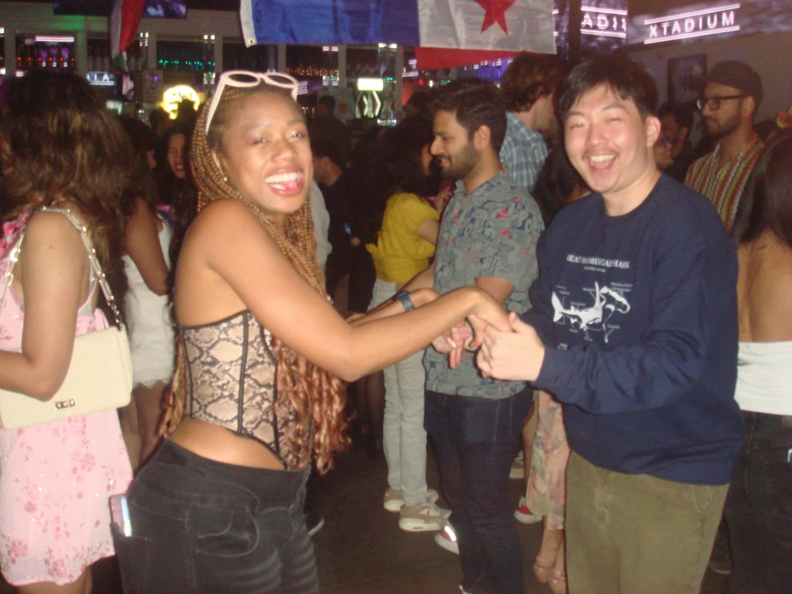 Guests dancing together during Latin Carnival.