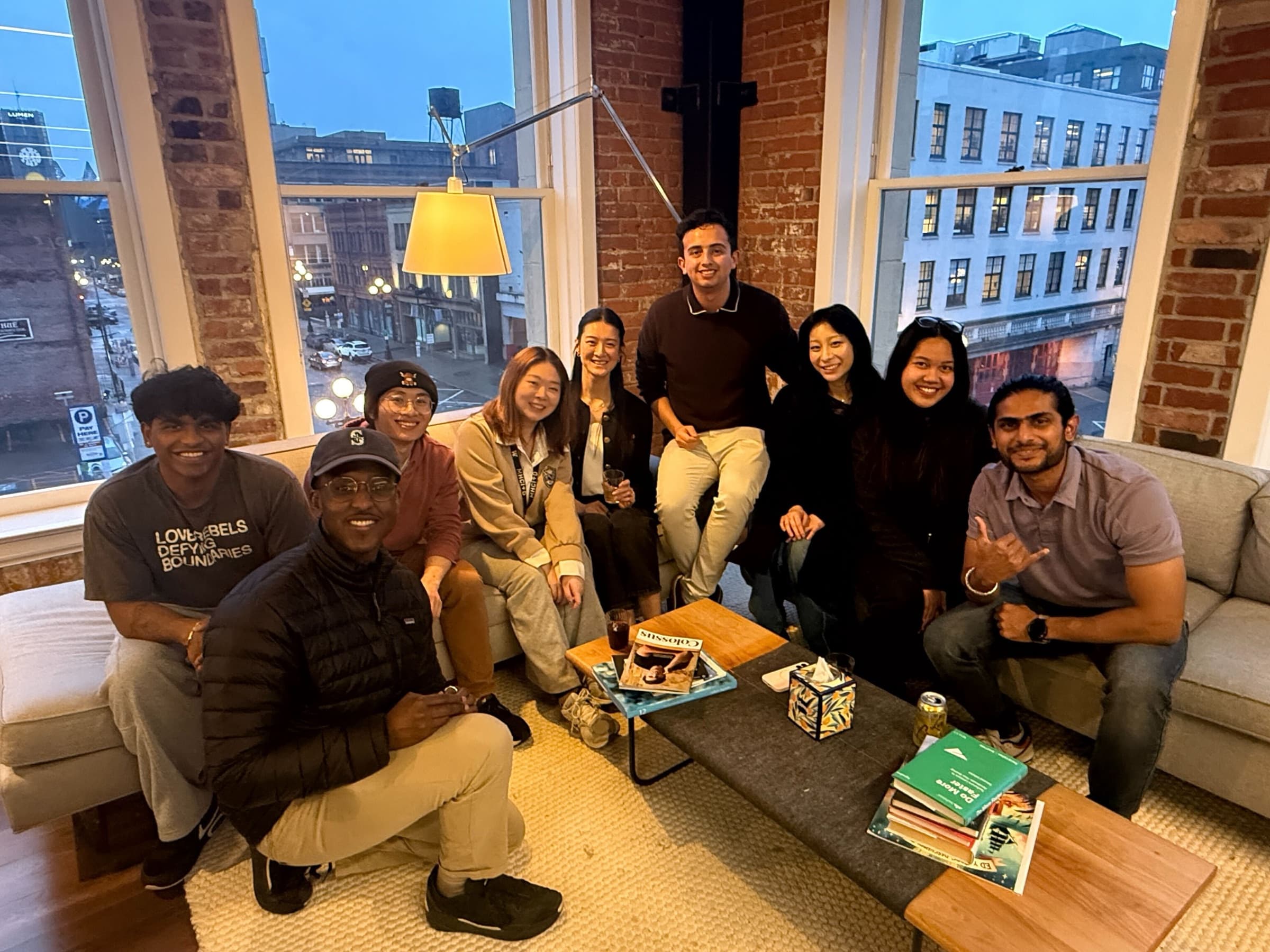 HeyLily team members gathered together on a sofa at Pioneer Square Labs.